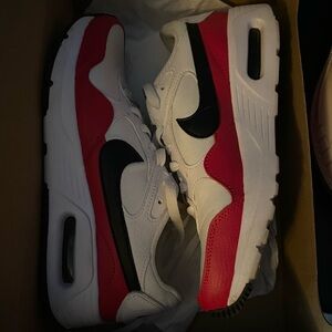 Hot pink black and white Nike women size 8
 sneaker